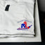 White t-shirt with ZR Quality Painting, LLC logo on a white background