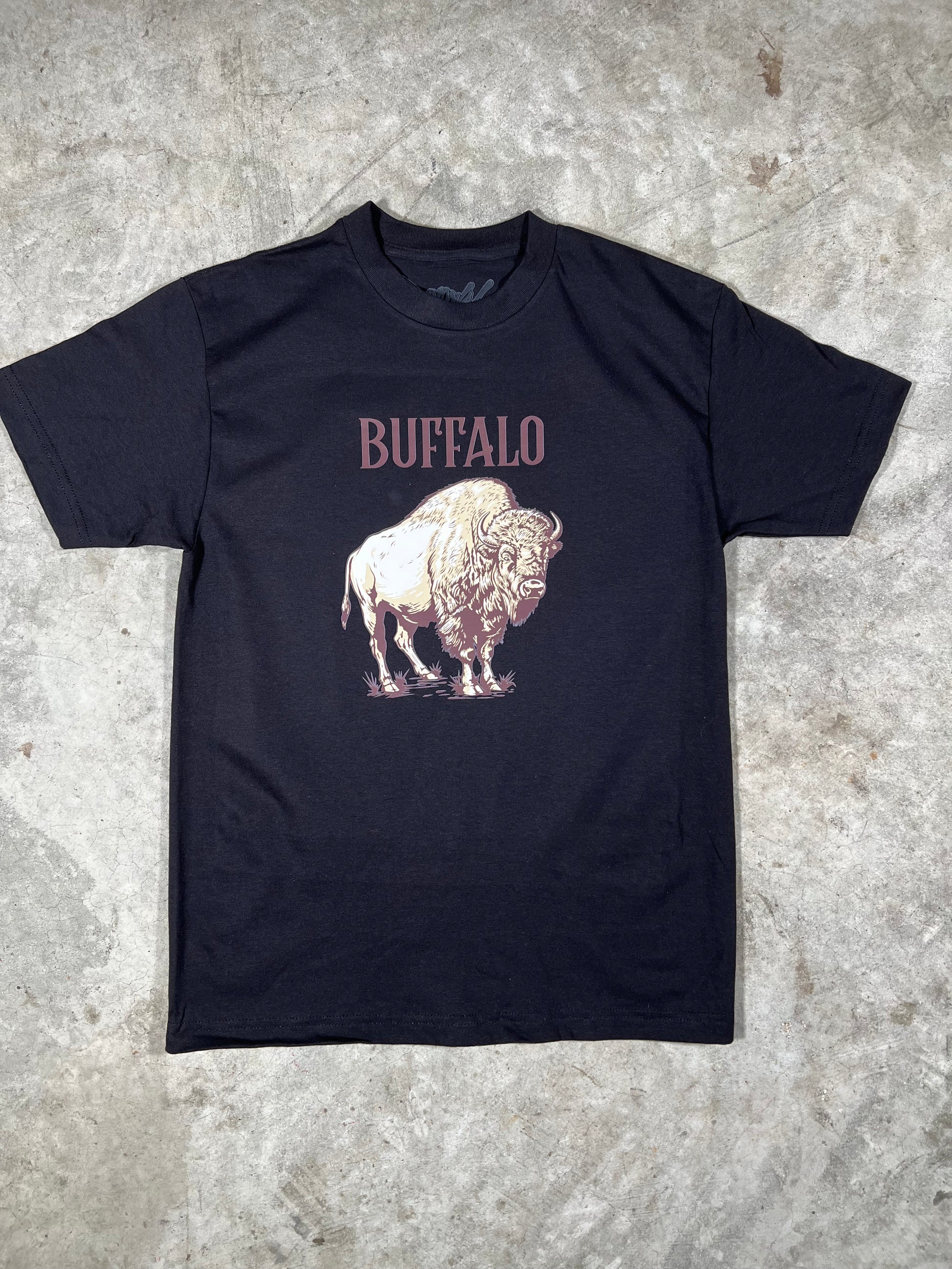 Black long-sleeve shirt with 'Buffalo' text and graphic on a textured surface