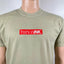 Mannequin wearing a green t-shirt with 'fashionINK.' logo on a white background