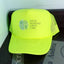 Neon yellow cap with 'Four Seasons Lawn Care' text on a dark surface