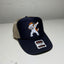 Navy blue cap with cartoon dog design on a white surface