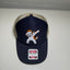 Navy blue cap with a cartoon dog design and 'Otto' branding on a white background