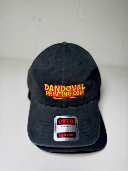 Black cap with 'Dandoval Printing.com' logo on a white background
